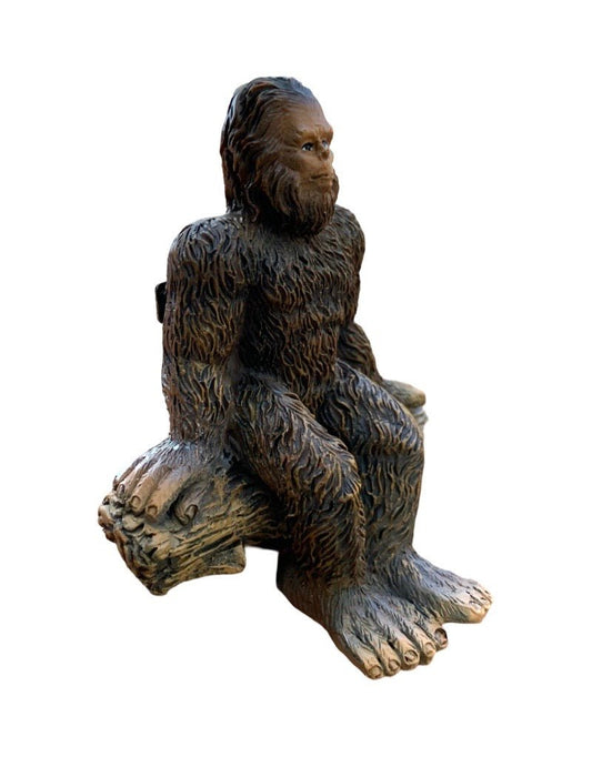 Fairy Sasquatch Sitting on a Log - The Garden Corner